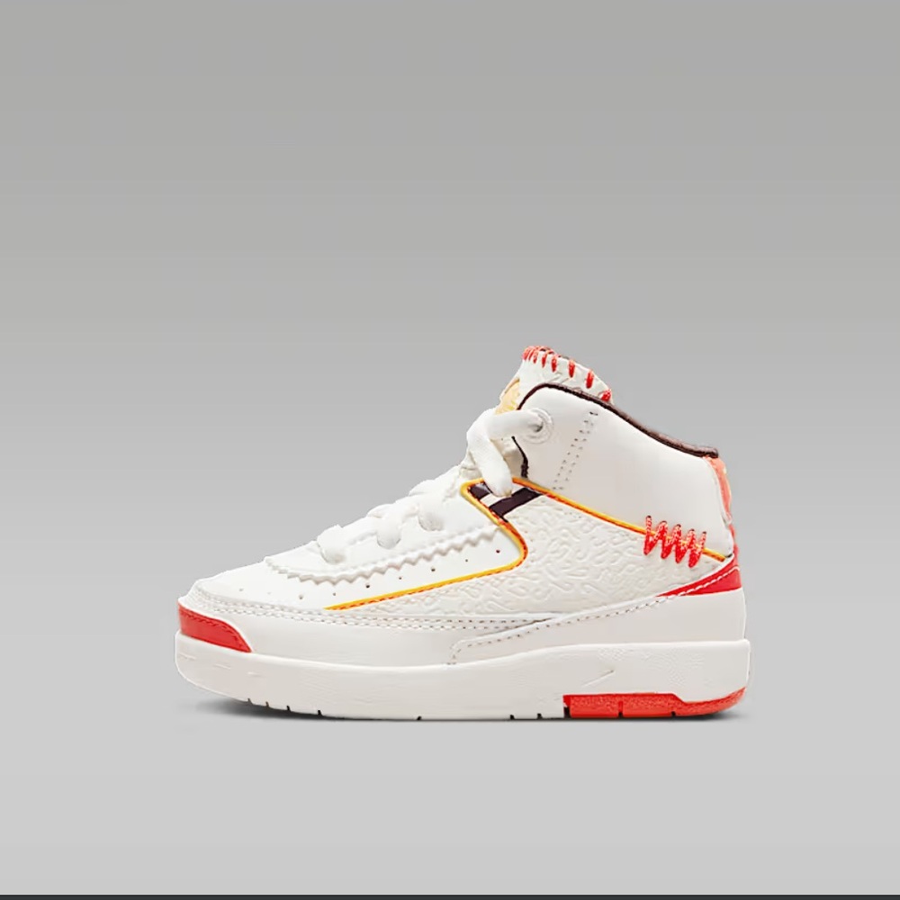 Toddler Retro Jordan orange and white sneakers